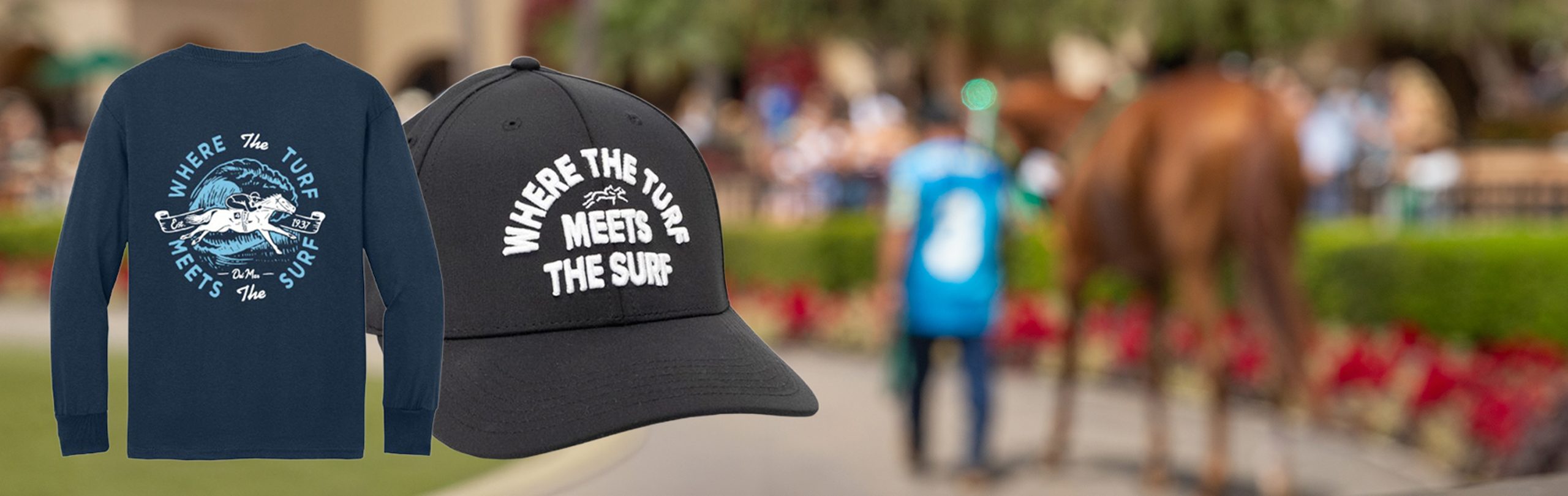 silks-gift-shop-2 Del Mar longsleeve shirt and Del Mar Cap displayed over paddock image.